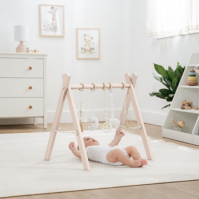 Comfy Cubs Wooden Baby Play Gym - Natural Finish Pinewood Baby Activity Gym with 5 Sensory Hanging Toys - Easy No-Tool Assembly, Safe and Durable for Infant Motor and Visual Development - Blush