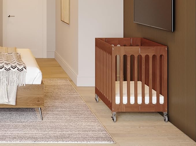 Foundations Boutique Folding Mini Baby Crib - Compact, Portable, Wooden Hotel Crib, Foldable Compact Cribs for Baby & Toddlers - Includes 3" Foam Mattress - Cherry