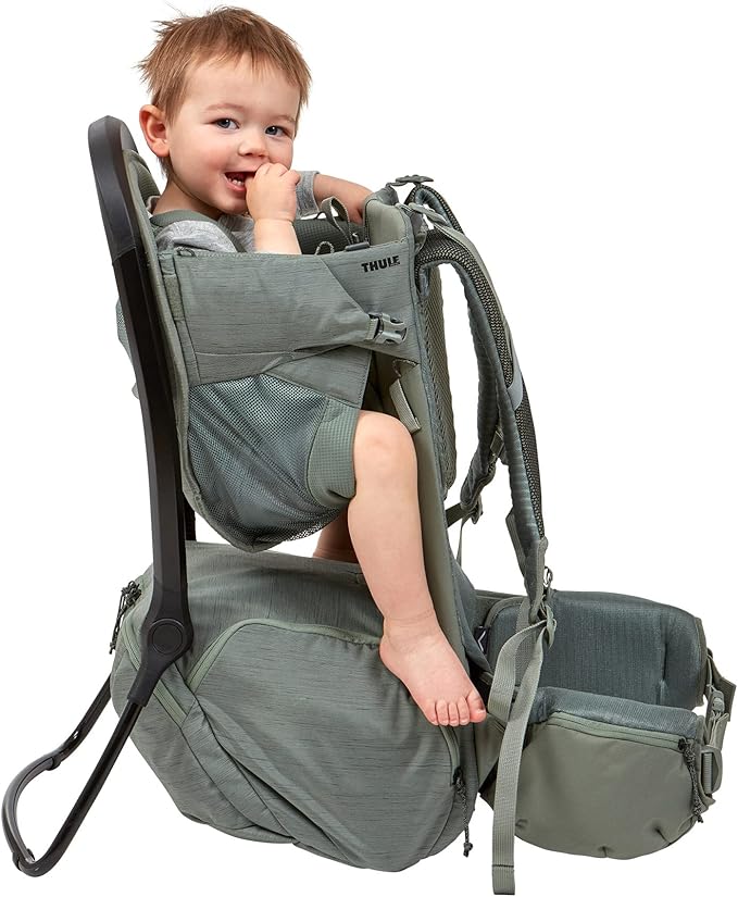 Thule Sapling Child Carrier Backpack - Machine Washable Seat - Self-Standing Frame - Adjustable padded straps for parents - Ergonomic seat with under-leg support for child - UPF 50 Sunshade