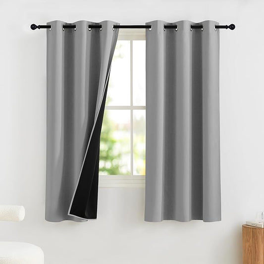 NICETOWN 100% Blackout Curtains for Bedroom Solid Thermal Insulated Grommet Room Darkening Curtains & Drapes Luxury Decor for Living Room Nursery, 42 x 63 Inch, Silver Grey, 2 Panels