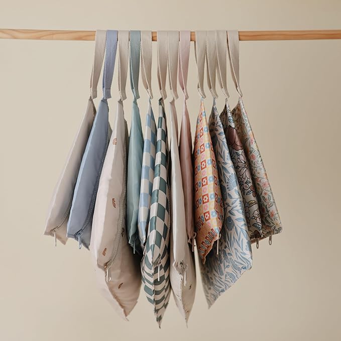 mushie Water Resistant Wet Bags | Large & Small Reusable Storage Bag for Baby Items and Travel | Zippered Pockets with Handle | Machine Washable, Set of 2 (Bees)