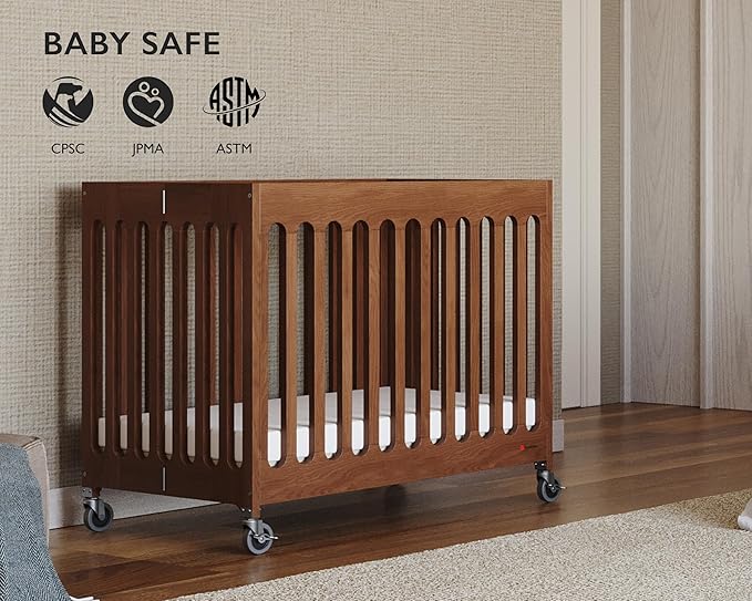 Foundations Boutique Folding Mini Baby Crib - Compact, Portable, Wooden Hotel Crib, Foldable Compact Cribs for Baby & Toddlers - Includes 3" Foam Mattress - Cherry